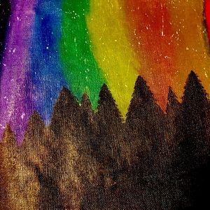 Acrylic painting of the northern lights that glows in the dark.